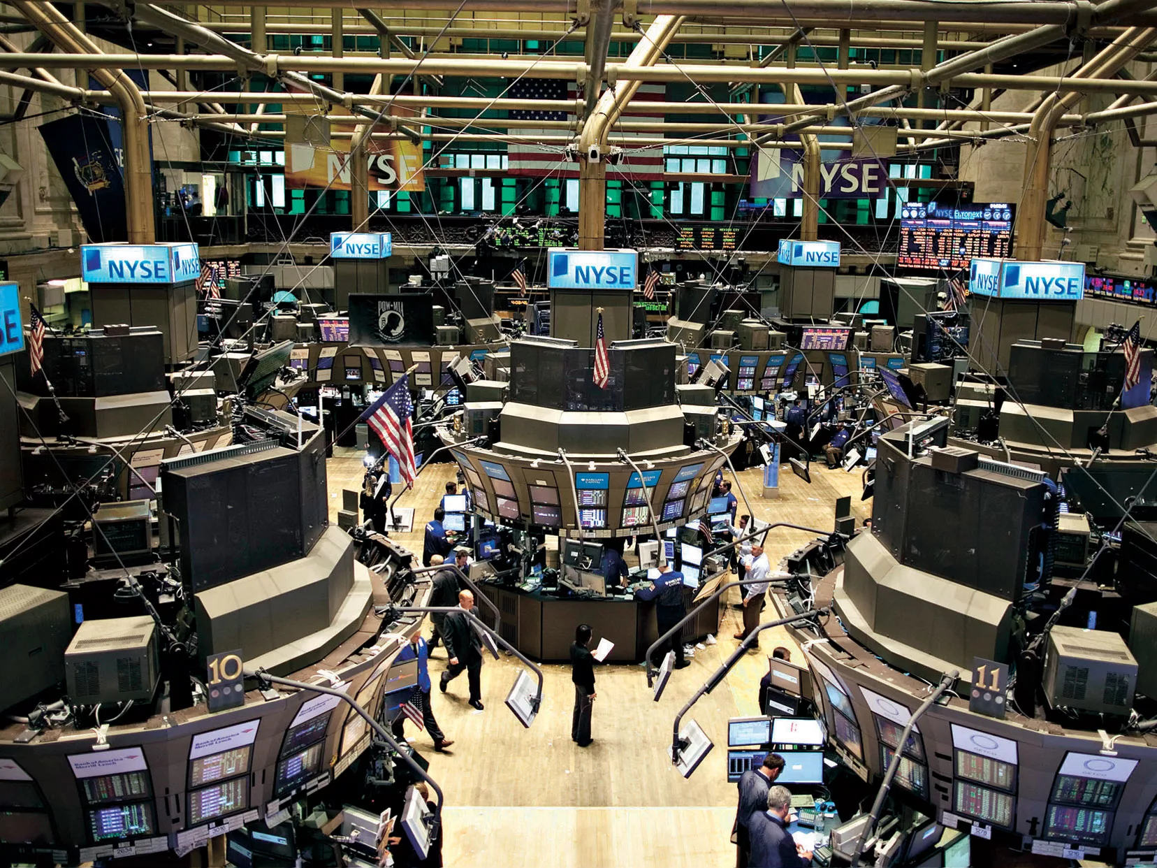 Wall Street financial stock index board displaying energy sector rally and trading activity