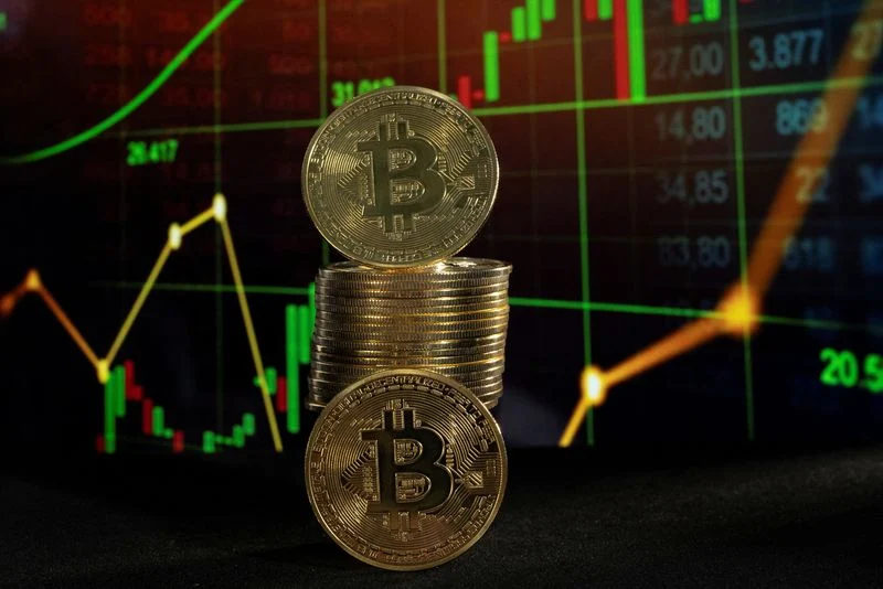 Bitcoin token on digital market chart with US Senate building background